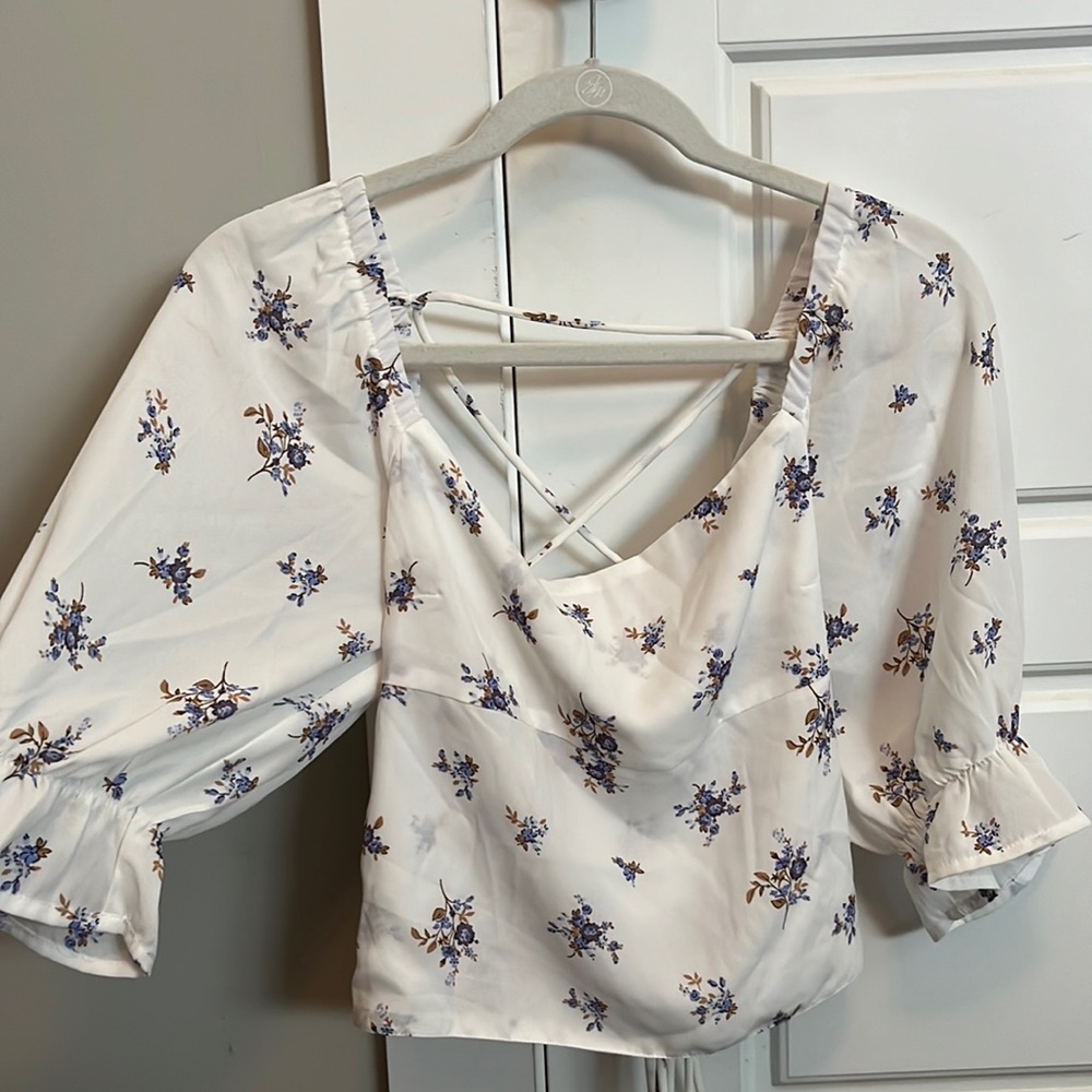 White floral blouse with open back and criss cross tie